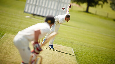 A bowler and batsman