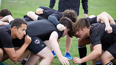 Players in a Rugby Scrum