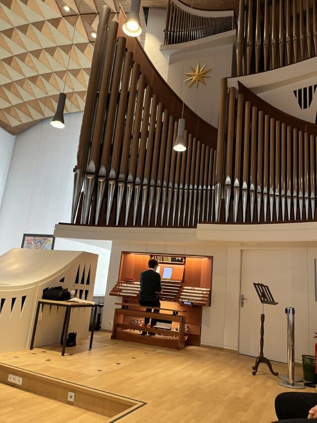 Organ with pipes as a pupil plays, located in St Nikolai